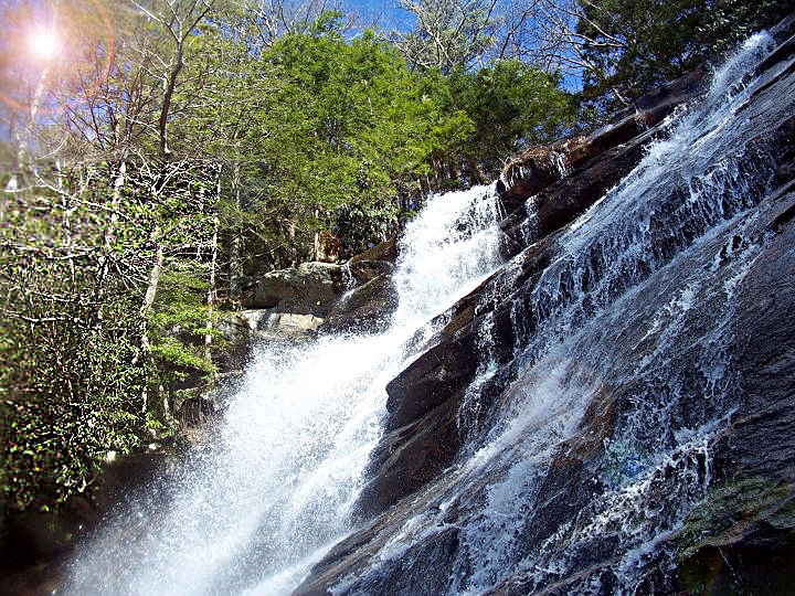 Panther Creek Falls in high water, white water pouring down a tall rock face in the Cohutta Wilderness